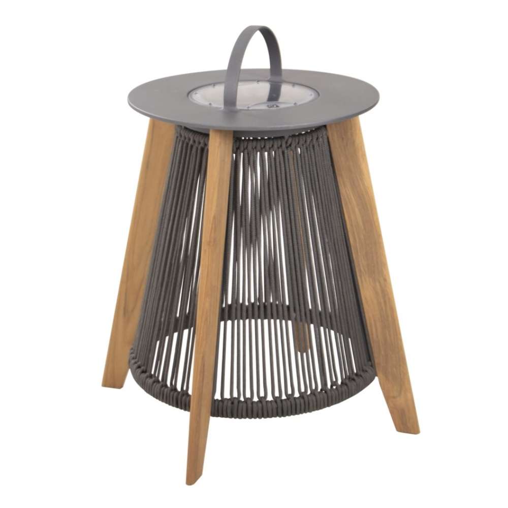Angled view of Westminster Teak Luna Large Lantern shows its sturdy wooden legs cylindrical rope body and flat metal top against a plain background