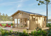 Angled back view of the Sawmill Structures Edwin Lake House PLUS 70MM Garden Room highlights its glass double doors, side windows, and a sunny natural setting by a lake