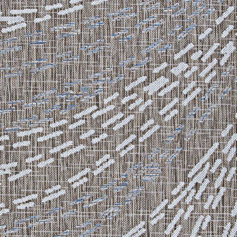 Angled view of the Couristan Charm Indoor/Outdoor Rug - Aurora/Twig reveals its soft surface with flowing dashed lines and earthy tones