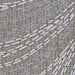 Angled view of the Couristan Charm Indoor/Outdoor Rug - Aurora/Twig reveals its soft surface with flowing dashed lines and earthy tones