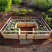 An overhead view of the Outdoor Living Today 12×8 Raised Garden Bed displays a U-shaped layout filled with various vegetables and flowers in rich soil