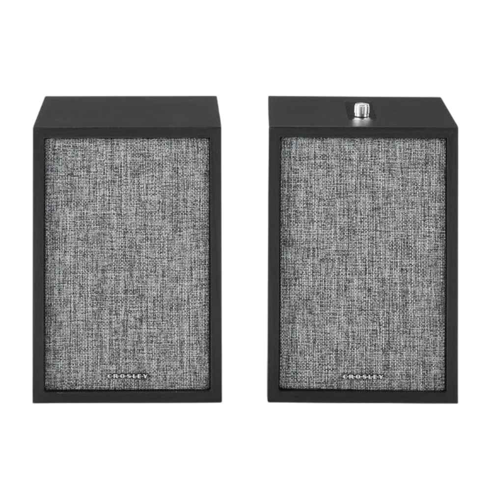 A pair of Crosley S200 Stereo Powered Speakers - Black, with a minimalist black woodgrain finish and textured front covers