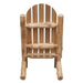 A rear view of the Fireside Lodge Voyageur Adirondack Chair, emphasizing its solid log support structure and rustic handcrafted charm