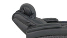 A reclining view of Valencia Oslo XL Home Theater Seating illustrating the motorized headrest and full recline position