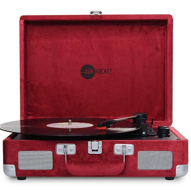 Arkrocket Curiosity Suitcase Bluetooth Turntable (Burgundy Velvet) front view shows built-in speakers and a compact, portable design with a velvet finish