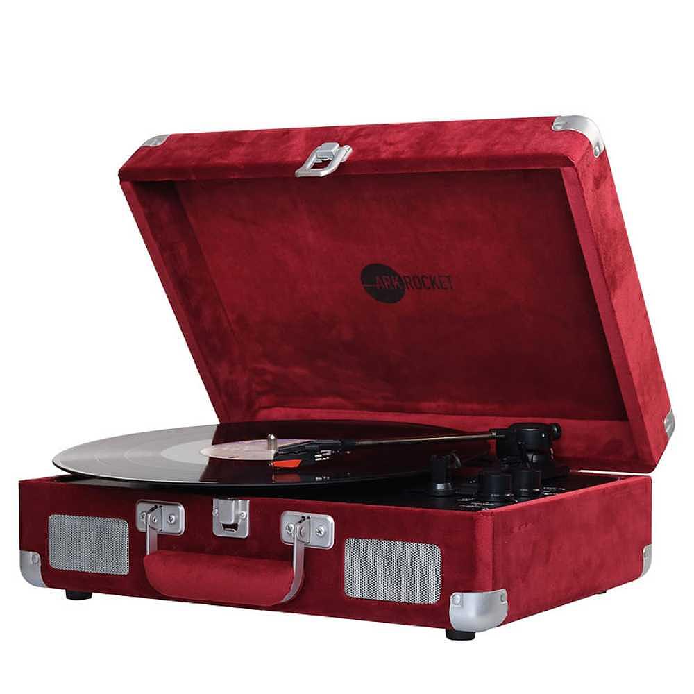 Arkrocket Curiosity Suitcase Bluetooth Turntable (Burgundy Velvet) is displayed with its lid open, showcasing a vinyl record on the turntable