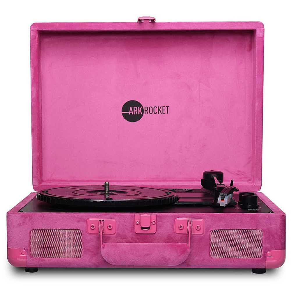 Arkrocket Curiosity Suitcase Bluetooth Turntable (Hot Pink Velvet) is fully open with the turntable exposed and its branding visible on the inner lid