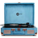 Arkrocket Curiosity Suitcase Bluetooth Turntable (Ocean Velvet) is shown open with a black vinyl record playing