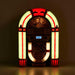 Arkrocket Elvis Presley Mini Jukebox Tabletop CD Player Bluetooth Speaker (BlackGold) shows a jukebox with vibrant red and green lights around the frame