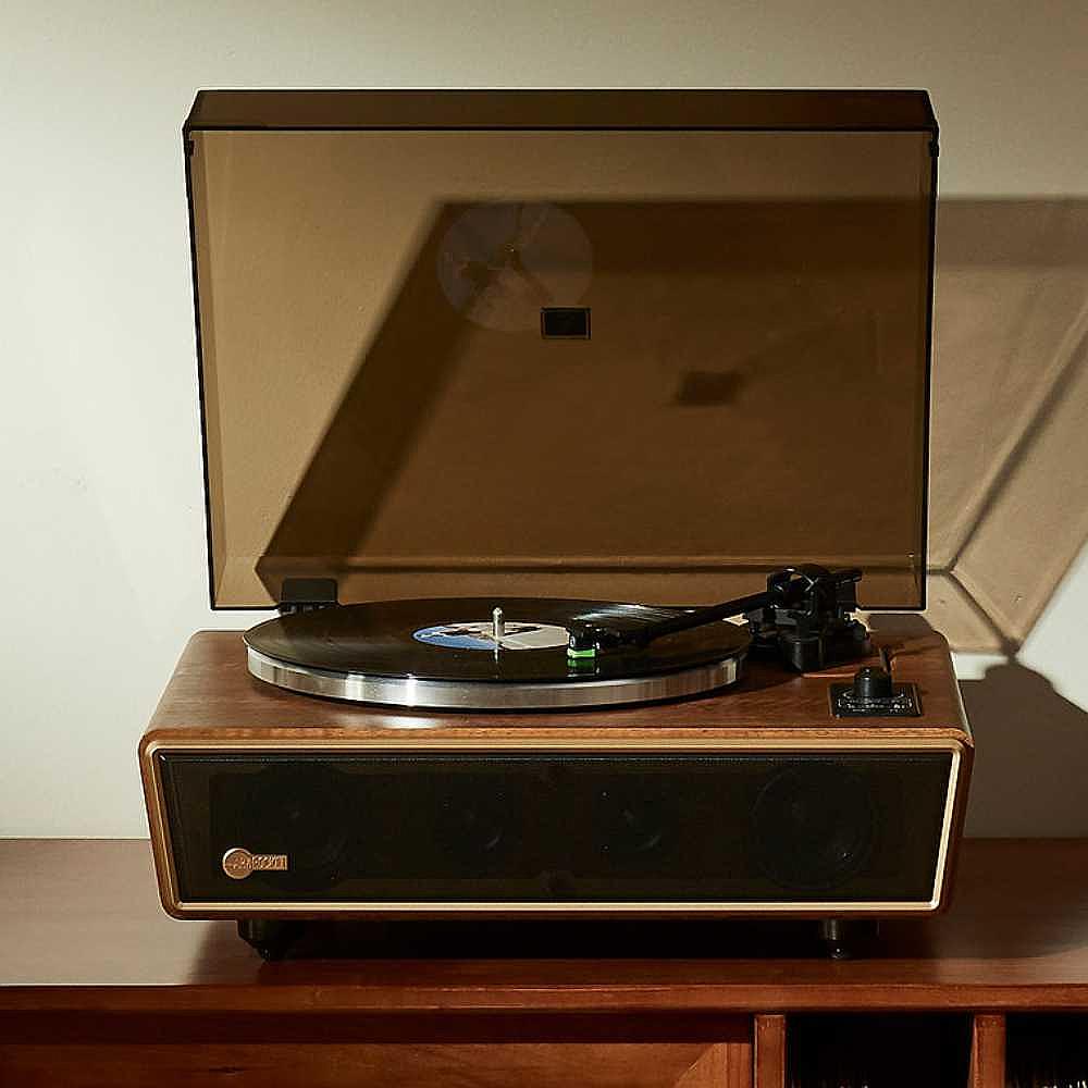 Arkrocket Huygens Bluetooth Turntable with Built-in Speakers (Walnut) on a wooden shelf