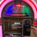 Arkrocket Taurus II Jukebox - Dark Oak 2024 New Upgrade playing music from a connected smartphone with a record player and glowing neon accents