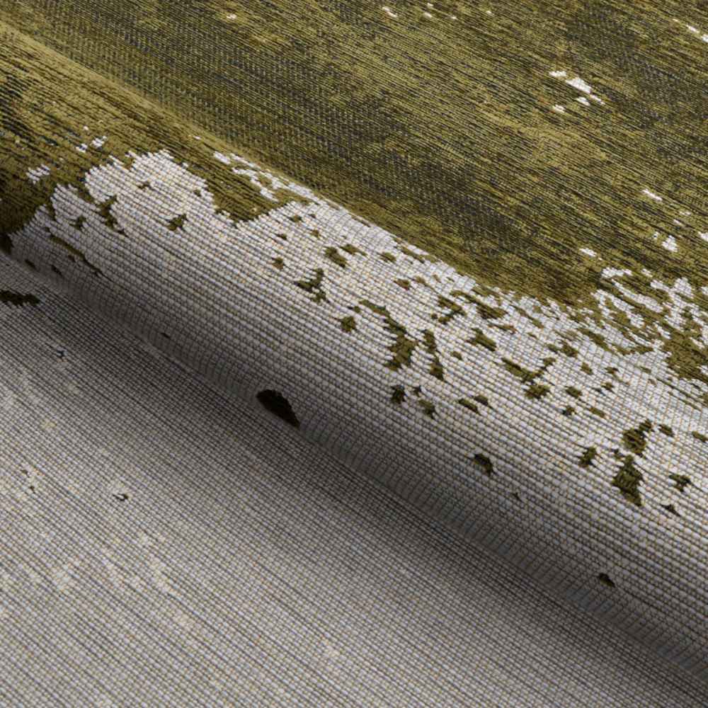 A rolled-up view of the Couristan Castille Indoor/Outdoor Rug - Canvas/Tea Leaf reveals its durable weave and artistic brushstroke-style design in green and beige