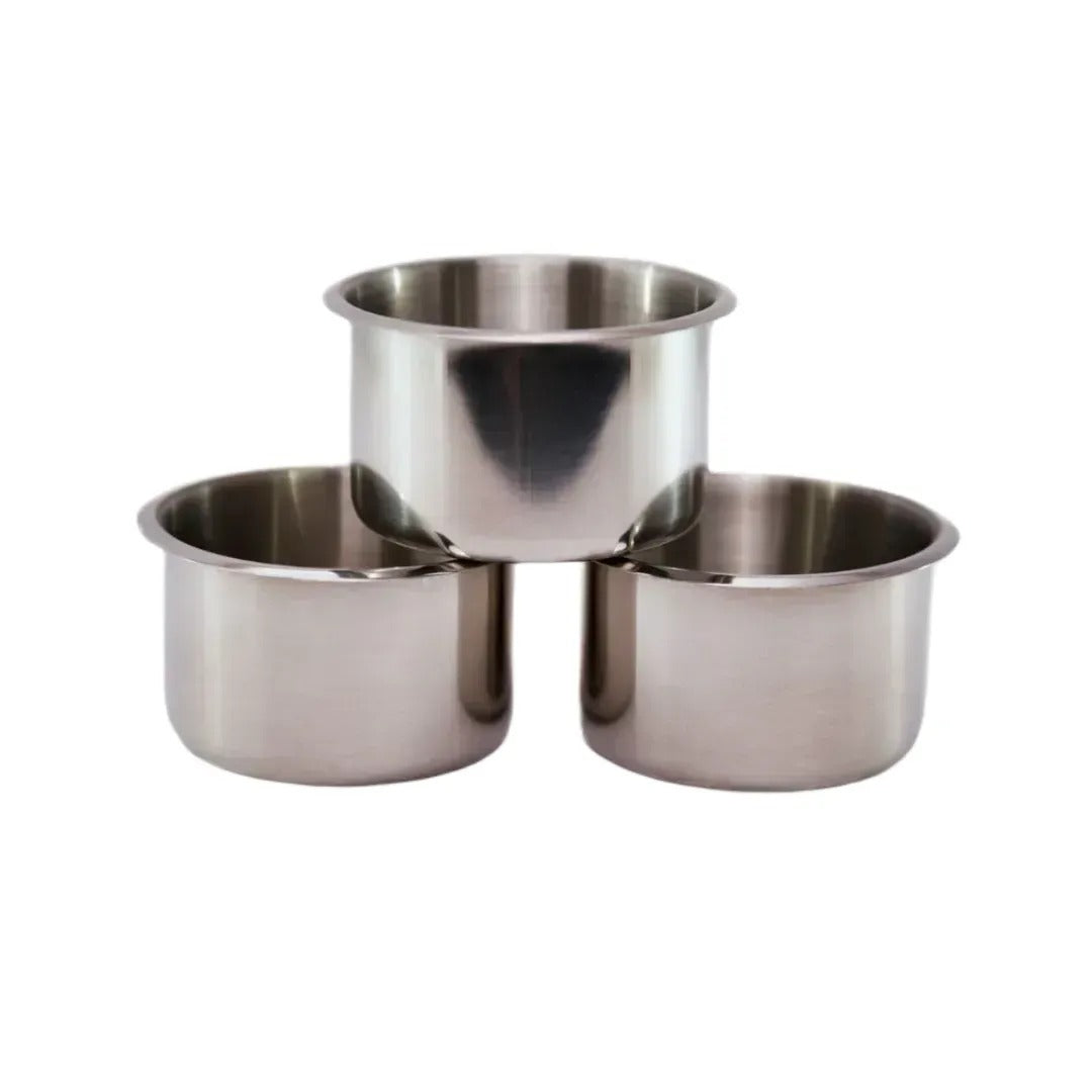 A set of three stacked 4inch stainless steel cups designed for a BBO poker tables.