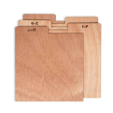 A set of three wooden Crosley A-Z Crate Dividers - Natural with tabs labeled A-H, I-P, and Q-Z for easy organization