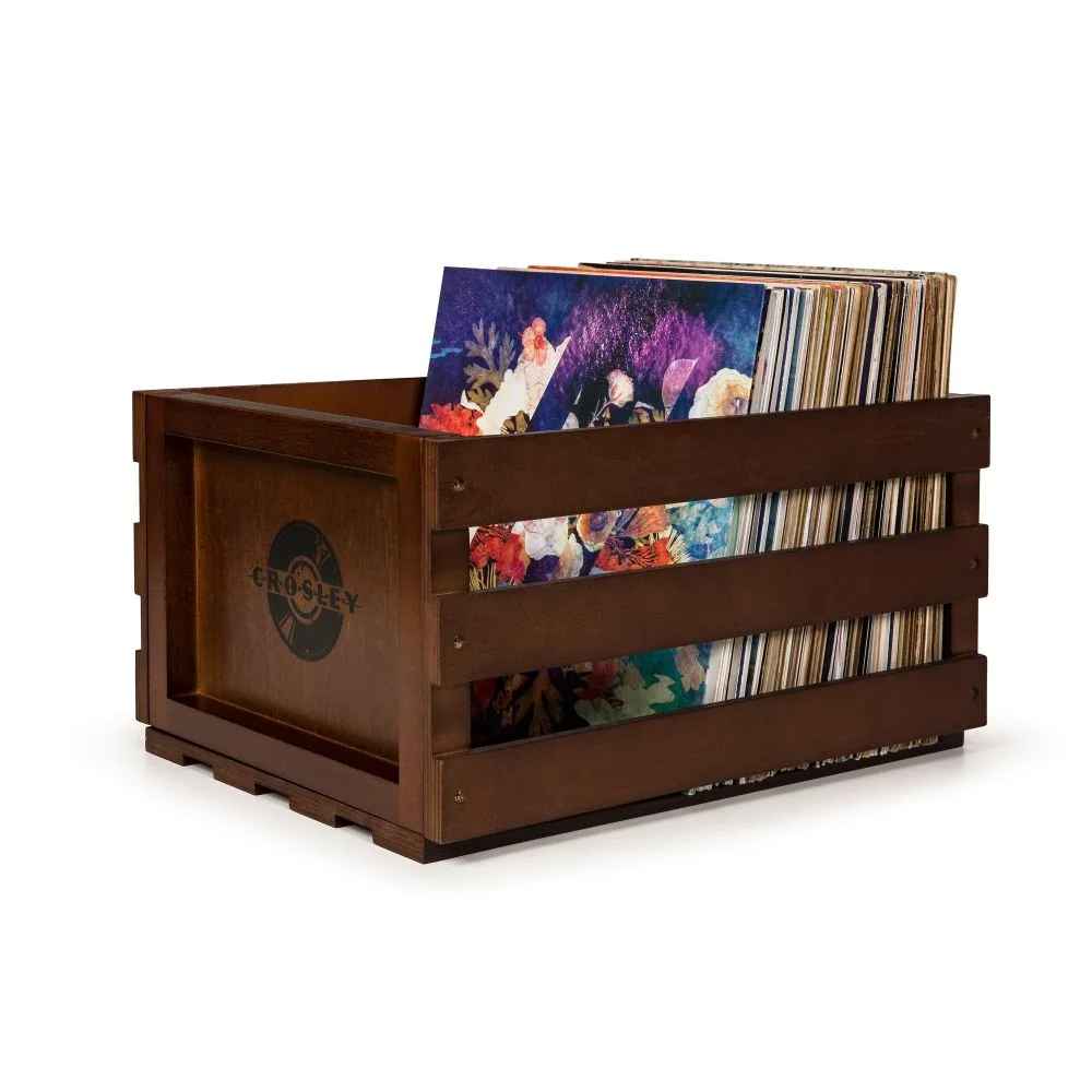 A side view of the Crosley Record Storage Crate - Mahogany displays its slatted wood structure and spacious interior