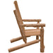 A side view of the Fireside Lodge Voyageur Two-Person Adirondack Chair, highlighting its rustic log frame, slanted seat, and sturdy armrests