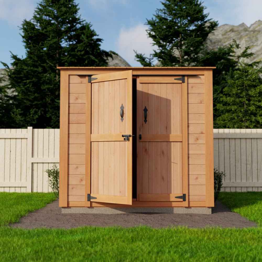 A straight-on view shows the Outdoor Living Today Grand Garden Chalet with cedar roof and one door ajar, set against a white fence and trees in a grassy yard