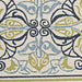A symmetrical section of the Couristan Covington Indoor/Outdoor Rug - Pegasus/Ivory-Navy-Lime features swirls and leaves in navy, slate blue, and lime