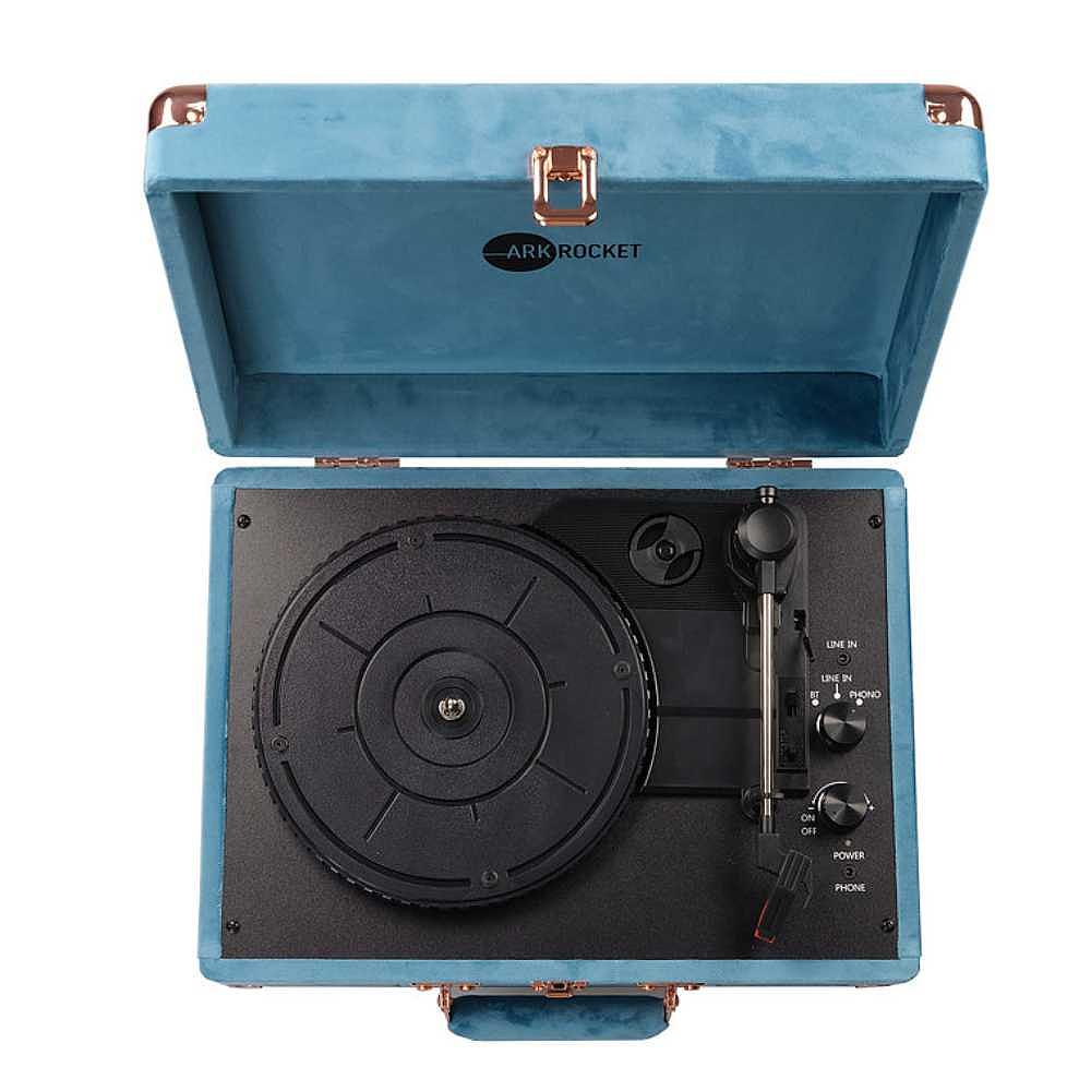 A top-down shot of Arkrocket Curiosity Suitcase Bluetooth Turntable (Ocean Velvet) with no record on it, displaying the black turntable and control knobs