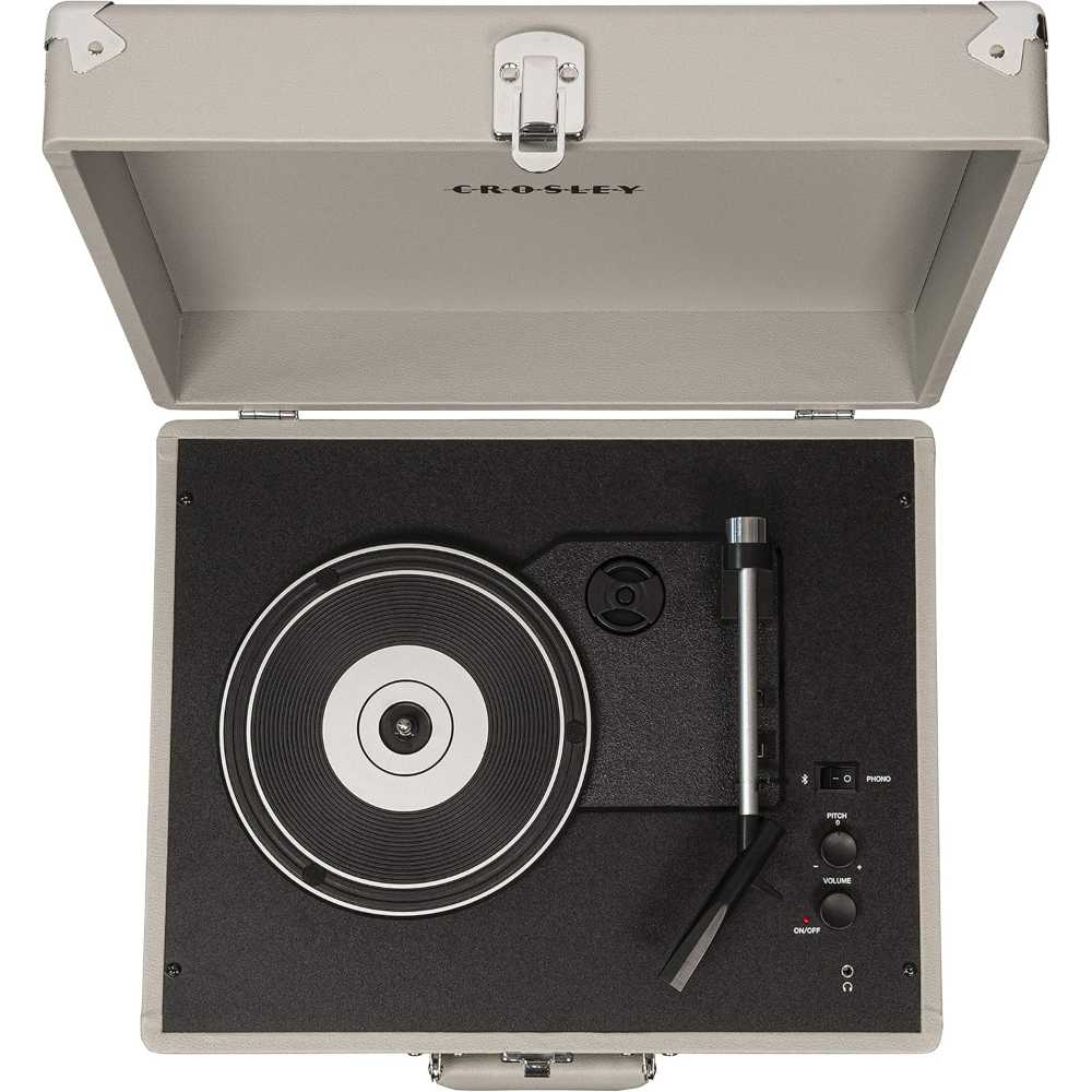 A top-down view of the Crosley Anthology Portable Turntable - Gray, showing the platter, tonearm, and control knobs inside the open turntable case