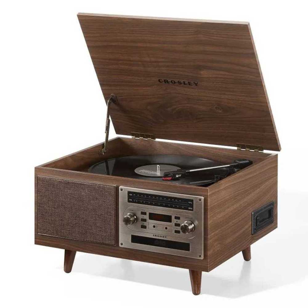 A turntable ready for playing vinyl records is included in the Crosley Serenade 8-In-1 Record Player - Walnut