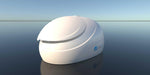 A white Dreampod Sport Float Pod appears to be floating peacefully on a calm, reflective water surface under a clear sky