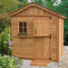 A wooden garden shed with a split barn-style door and flower box under a window, highlighting the Outdoor Living Today 8×8 Gardener Shed