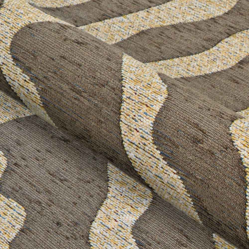 A zoomed-in angle of the Couristan Castille Indoor/Outdoor Rug - Fiore/Mocha highlights its textured weave and curved beige pattern on a mocha background