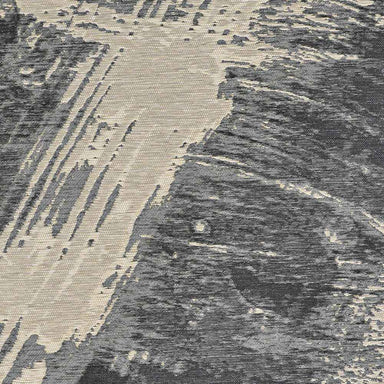 A zoomed-in section of the Couristan Castille Indoor/Outdoor Rug - Canvas/Glacier highlights its sweeping brushstroke design and detailed weave