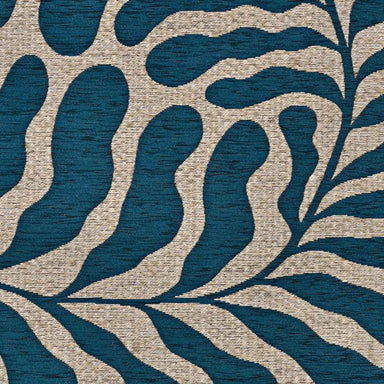 A zoomed-in section of the Couristan Castille Indoor/Outdoor Rug - Fiore/Petrol reveals a crisp, symmetrical pattern of teal leaves on a beige background