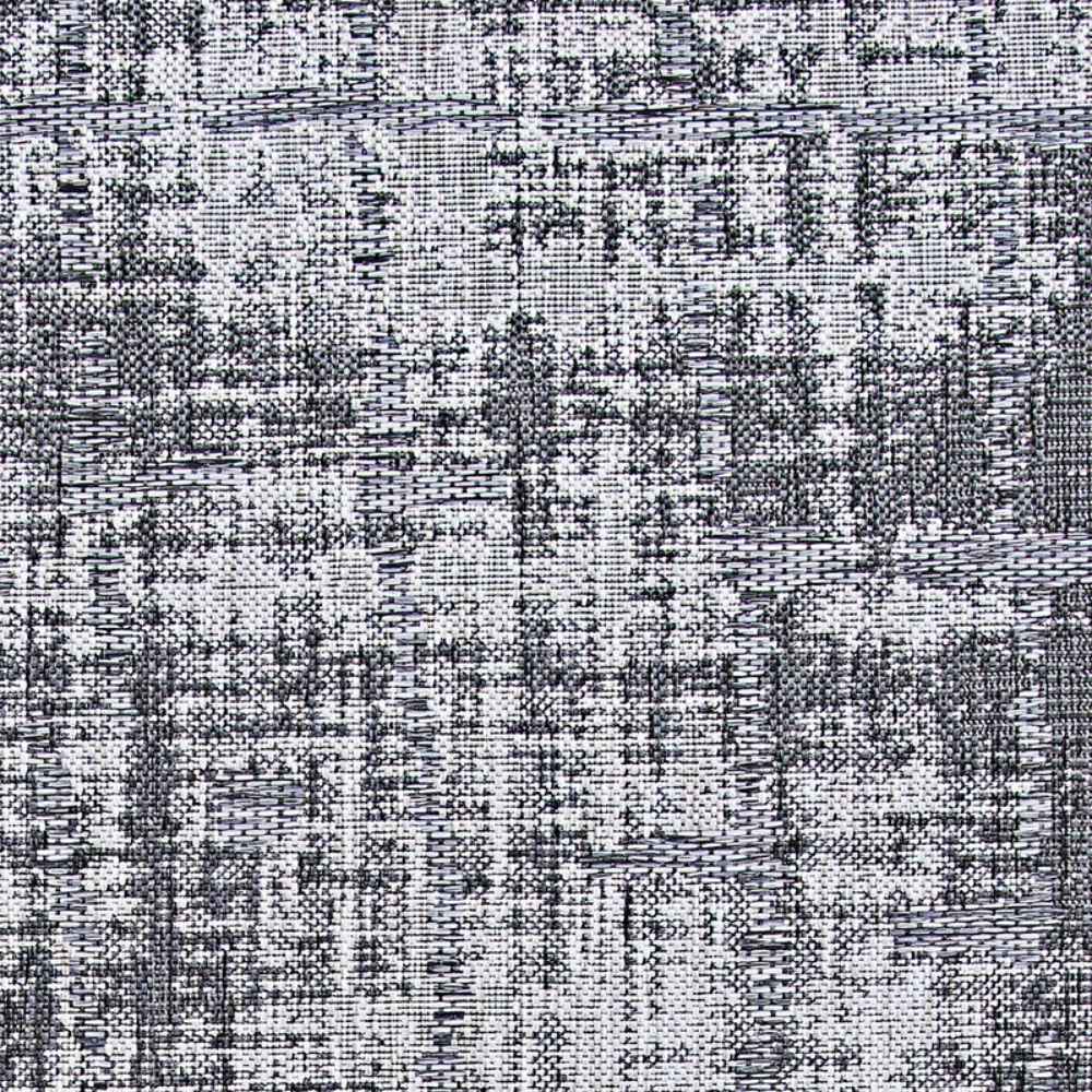 A zoomed-in section of the Couristan Charm Indoor/Outdoor Rug - Tiverton/Anthracite-Light Grey highlights the intricate, pixelated pattern in black and grey shades