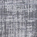 A zoomed-in section of the Couristan Charm Indoor/Outdoor Rug - Tiverton/Anthracite-Light Grey highlights the intricate, pixelated pattern in black and grey shades