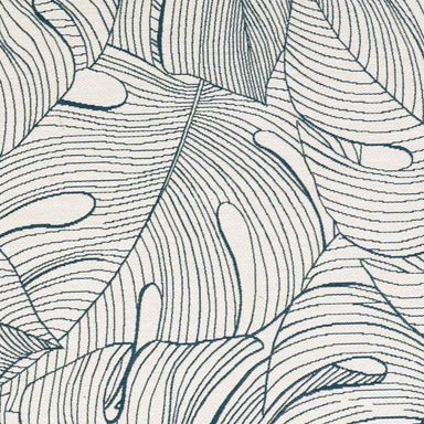 A zoomed-in view of the Couristan Castille Indoor/Outdoor Rug - Palma/Petrol reveals intricate overlapping leaf designs in fine lines