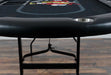 BBO Poker Tables Aces Pro Plus Poker Table is displayed with a sturdy foldable frame and a focus on its smooth black armrest and convenient cup holders