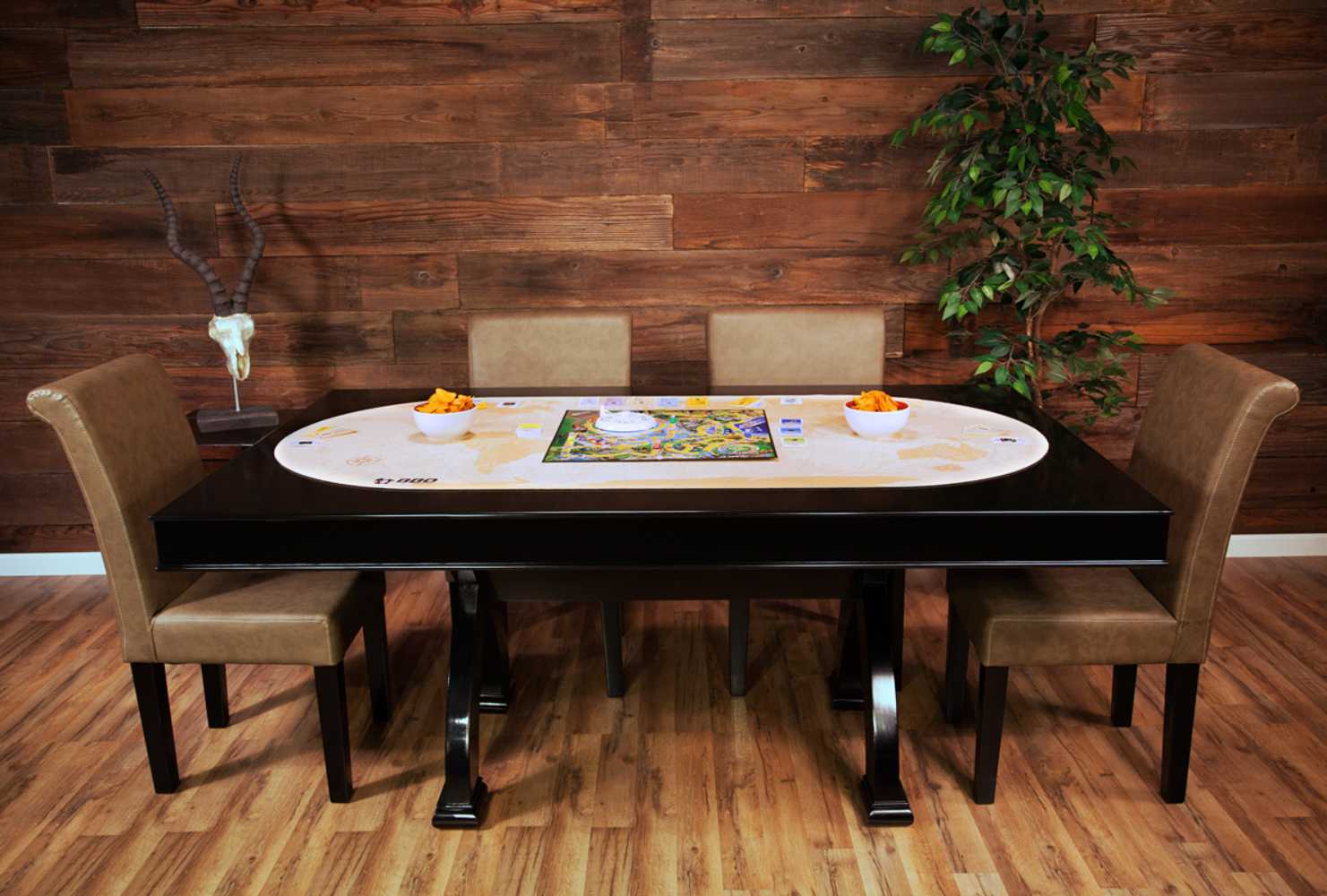 BBO Poker Tables Portable Poker Party Mat - World Traveler mat is placed on a black table, with snacks and a board game set up