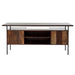 Back of Crate & Barrel Sedgwick Solid Acacia Wood Desk with Storage shows two side cabinets with doors and open center shelving