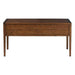 Back view of Crate & Barrel Morris 60" Chocolate Brown Writing Desk showing its solid wood panel construction and tapered legs
