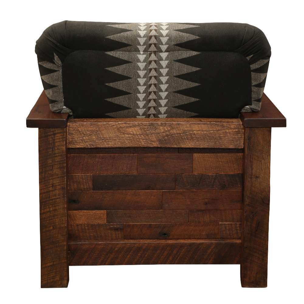 Back view of Fireside Lodge Barnwood Americana Lounge Chair displays its rustic reclaimed-wood frame and a cushioned backrest featuring bold triangular patterns