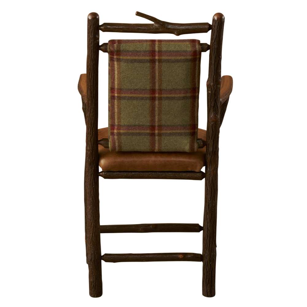 Back view of Fireside Lodge Hickory Log South Fork Counter Stool features its natural log frame, branch-style top rail, and plaid fabric back cushion