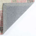 Back corner shows the sturdy gray fabric backing of Momeni Anatolia Indoor Rug - ANA-2 Pink