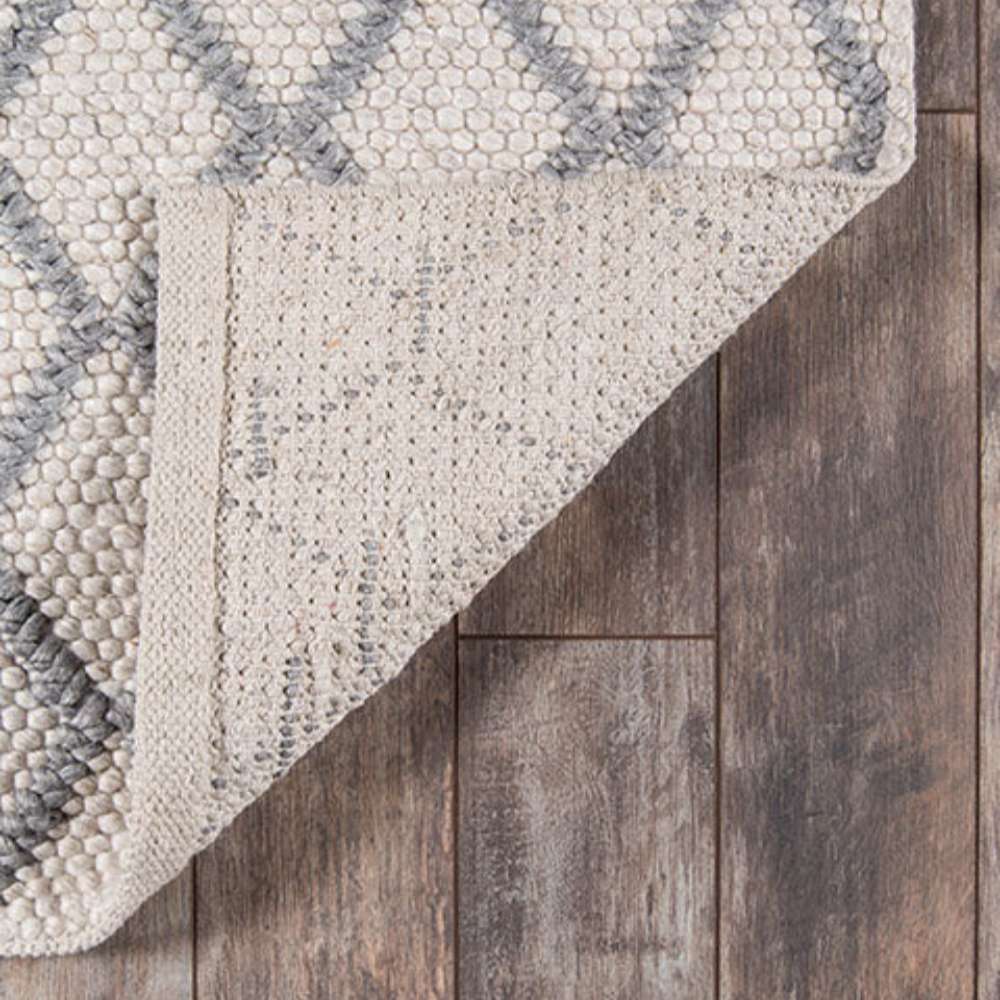 Back view of Momeni Andes Indoor Rug - AND-7 Natural shows its sturdy woven foundation