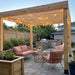 Backyard patio with seating and string lights under the Outdoor Living Today Western Red Cedar Urban Escape Pergola