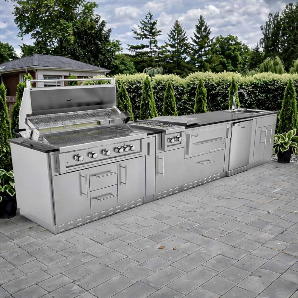 Backyard view of Sunstone French Quarter 13ft 7in Outdoor Kitchen Island Package with open grill and full stainless steel kitchen layout