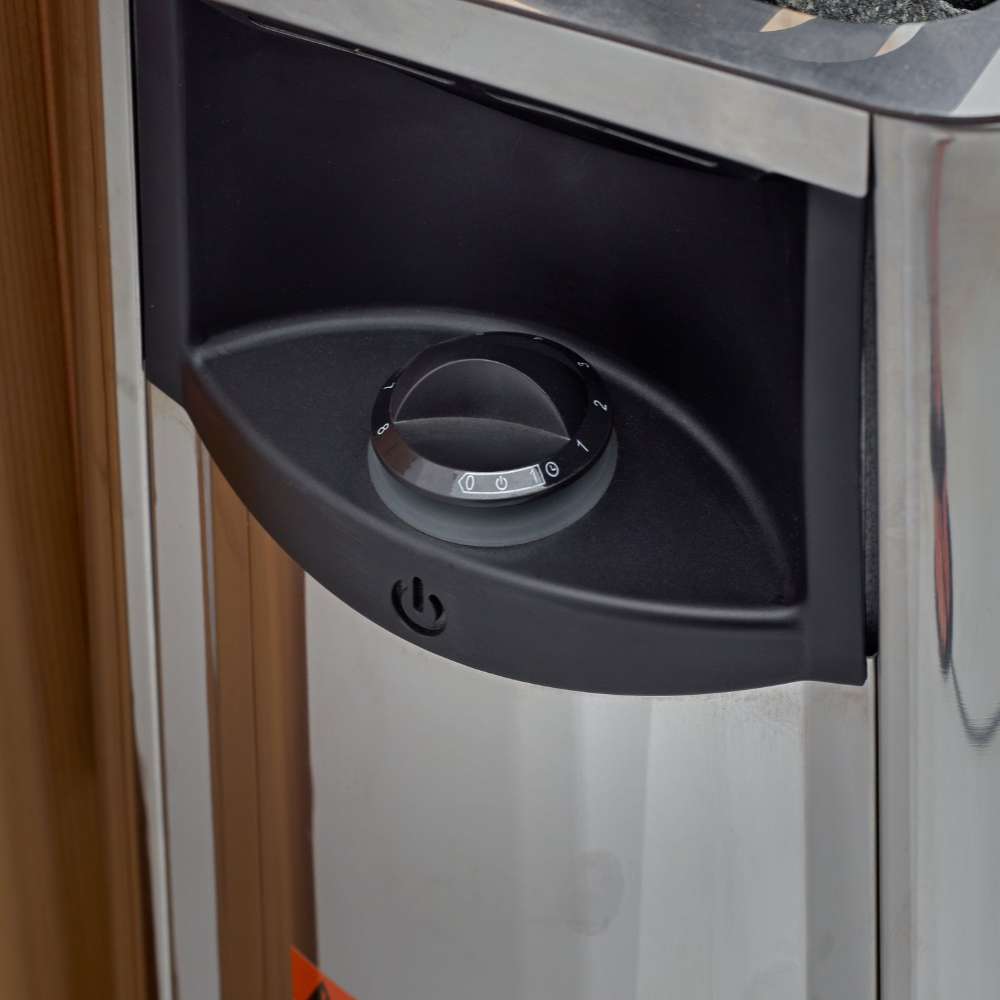 Black control dial on the front of the stainless steel Harvia stove in Golden Designs Sundsvall 2 Person Traditional Sauna