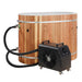 Black hoses run from a black chiller with a front fan to the side valves of Golden Designs Dynamic Cold Therapy Oval Barrel Pacific Cedar Cold Plunge