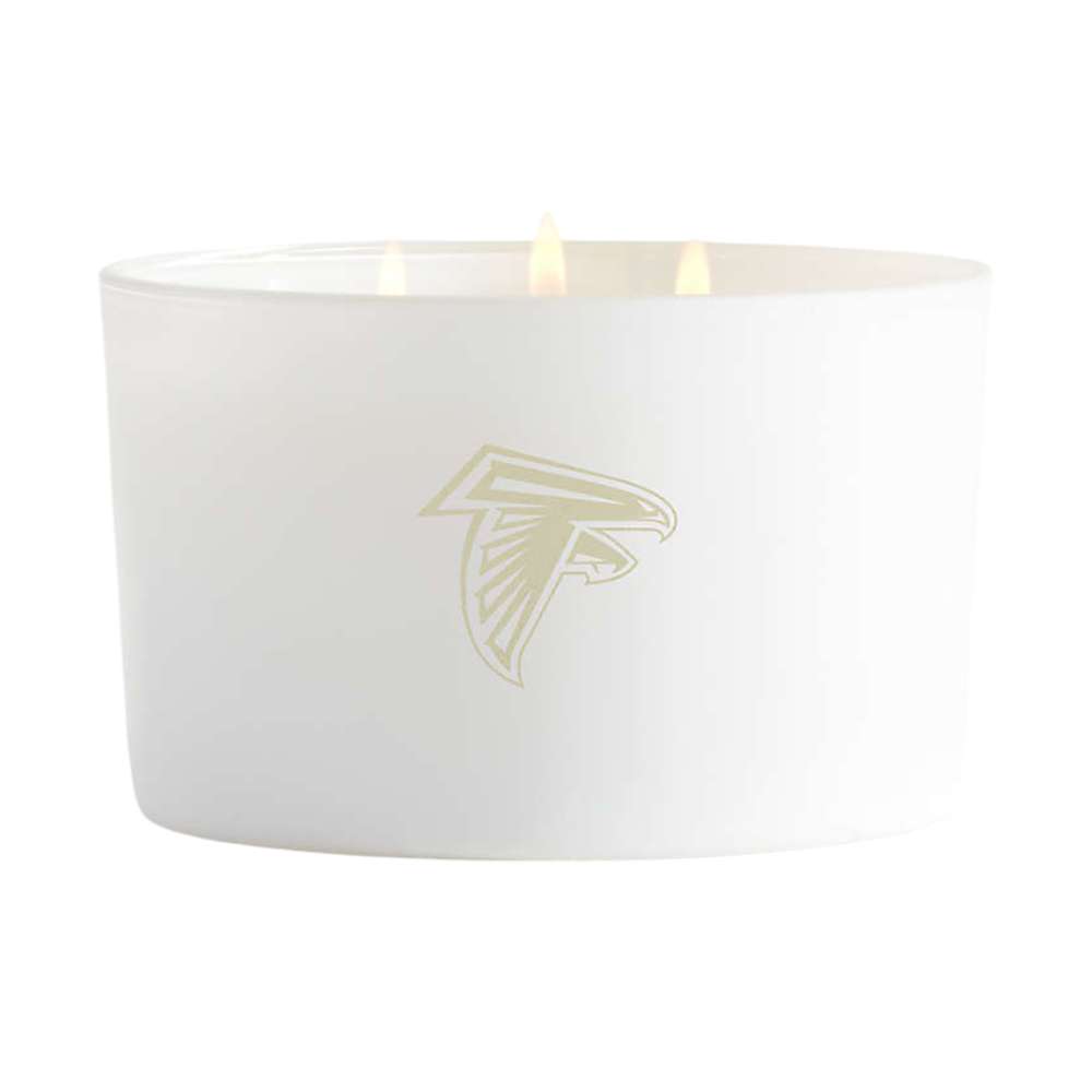Blanc white three-wick Crate & Barrel Monochrome Scented Candle featuring a subtle Atlanta Falcons logo on the front