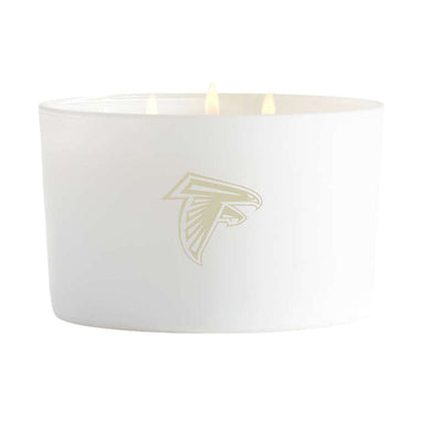 Blanc white three-wick Crate & Barrel Monochrome Scented Candle featuring a subtle Atlanta Falcons logo on the front