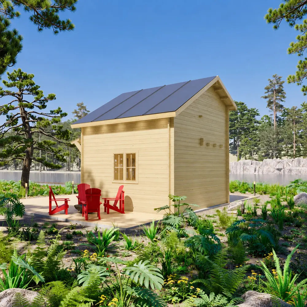 Rear-side view of the light-wood BlueWater Loft 160 with red Adirondack chairs amid lush forest landscaping.