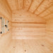 Empty Bluewater Den 67 interior with natural pine walls, matching flooring, a high pitched ceiling and exposed wooden rafters.