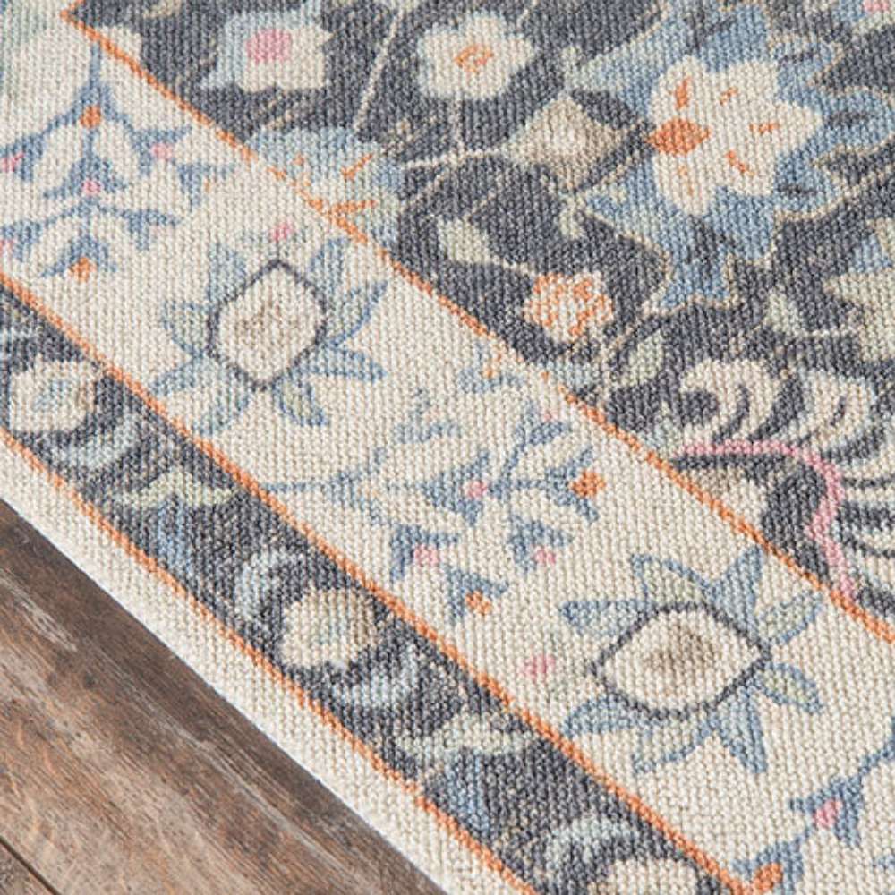 Border of Momeni Anatolia Indoor Rug - ANA-8 Charcoal highlights delicate blue and ivory floral designs with orange accents